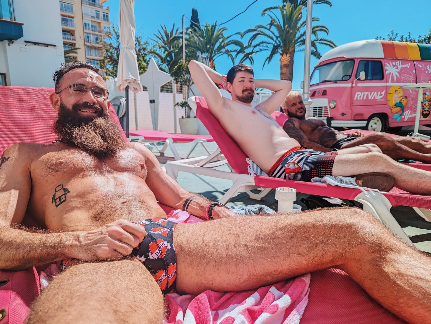 CJbeardedbrit, BobSteelXXX, and BjornAndrey Poolside in the Daddy Briefs by Alex Mac Design