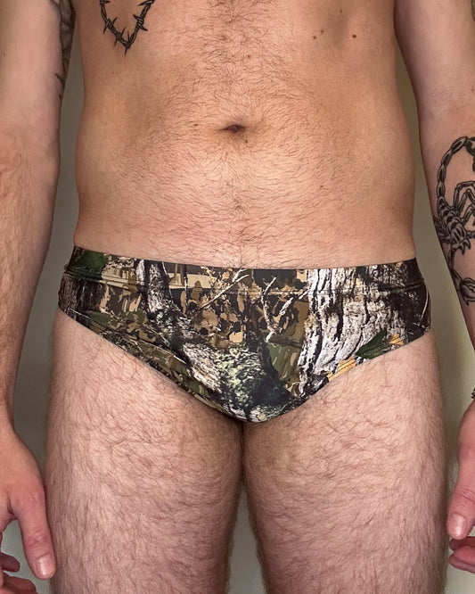 Cuntry Camo Swim Briefs, Real Camouflage Forrest Tree Country Swimsuit, Gay Men's Swimming Trunks, LGBTQ Pride Western Cowboy Bathing Suit